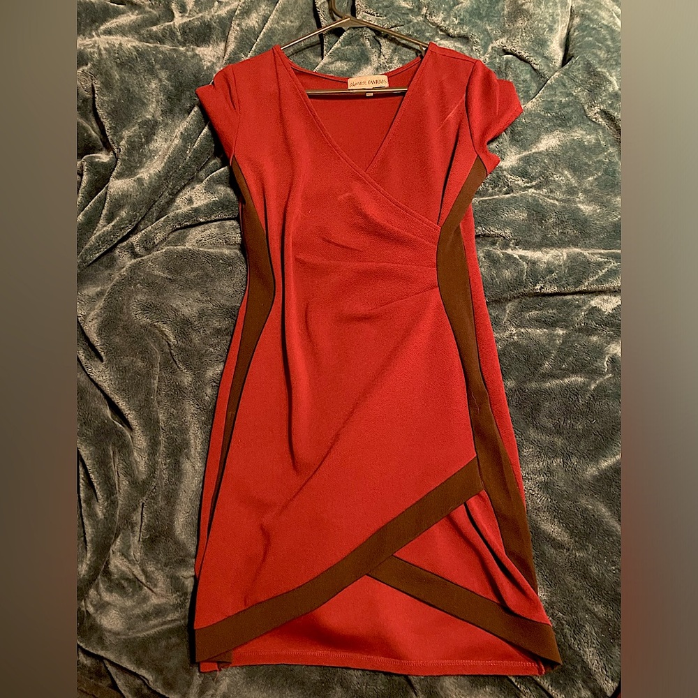 An Almost Famous midi, burgundy dress with black stripe and deep V